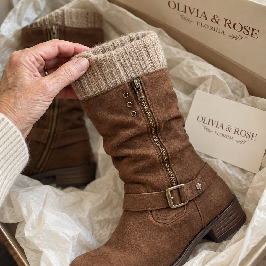 A hand touching the soft knitted cuff of the Bonnie boot