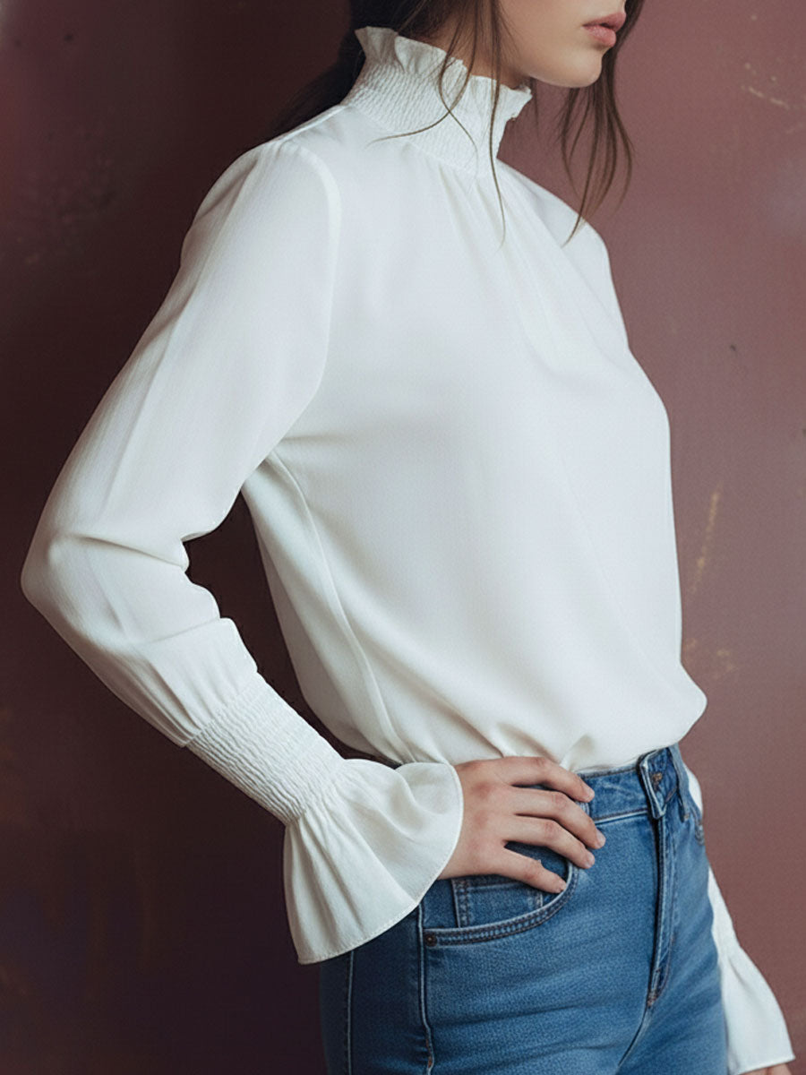 Elegant High Neck White Blouse With Smocked Cuffs And Ruffle Details