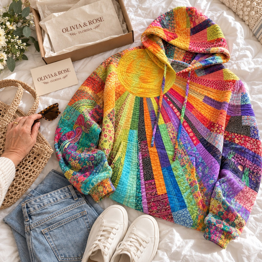 The Amanda hoodie laid out with jeans and white sneakers