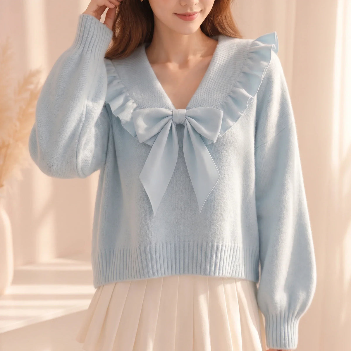 Bellavelle – Chiffon Ruffle Bow Knit Top